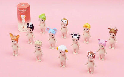 Sonny Angel Animal Series Ver.2 collectible figures with various animal hats on pink background, pop mart style