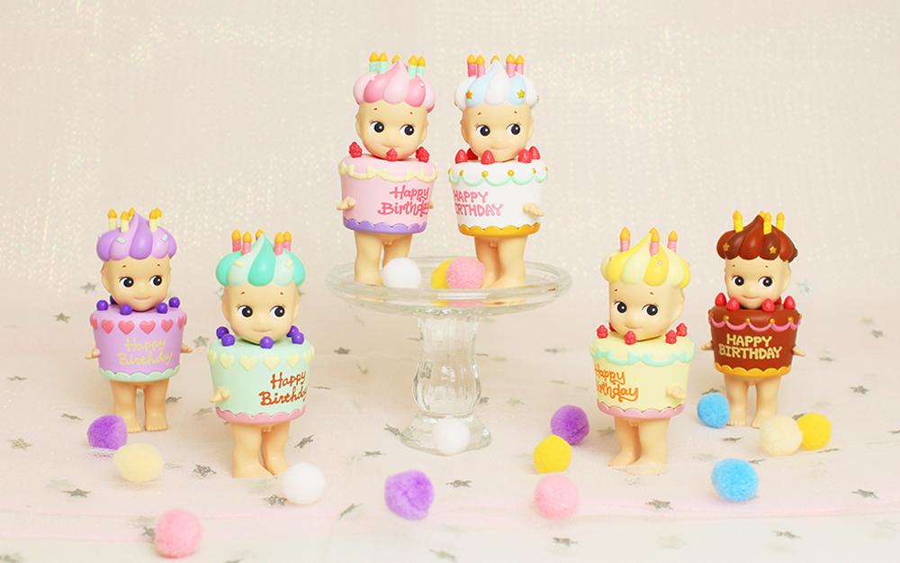 Pop Mart Sonny Angel birthday cake figures with candles, colorful pom-poms, celebrating gift collectible